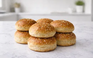 Pan de Hamburguesa Congelado Harina de Kamut producido en CR Finca Tierra de Sueños - 8 Unidades